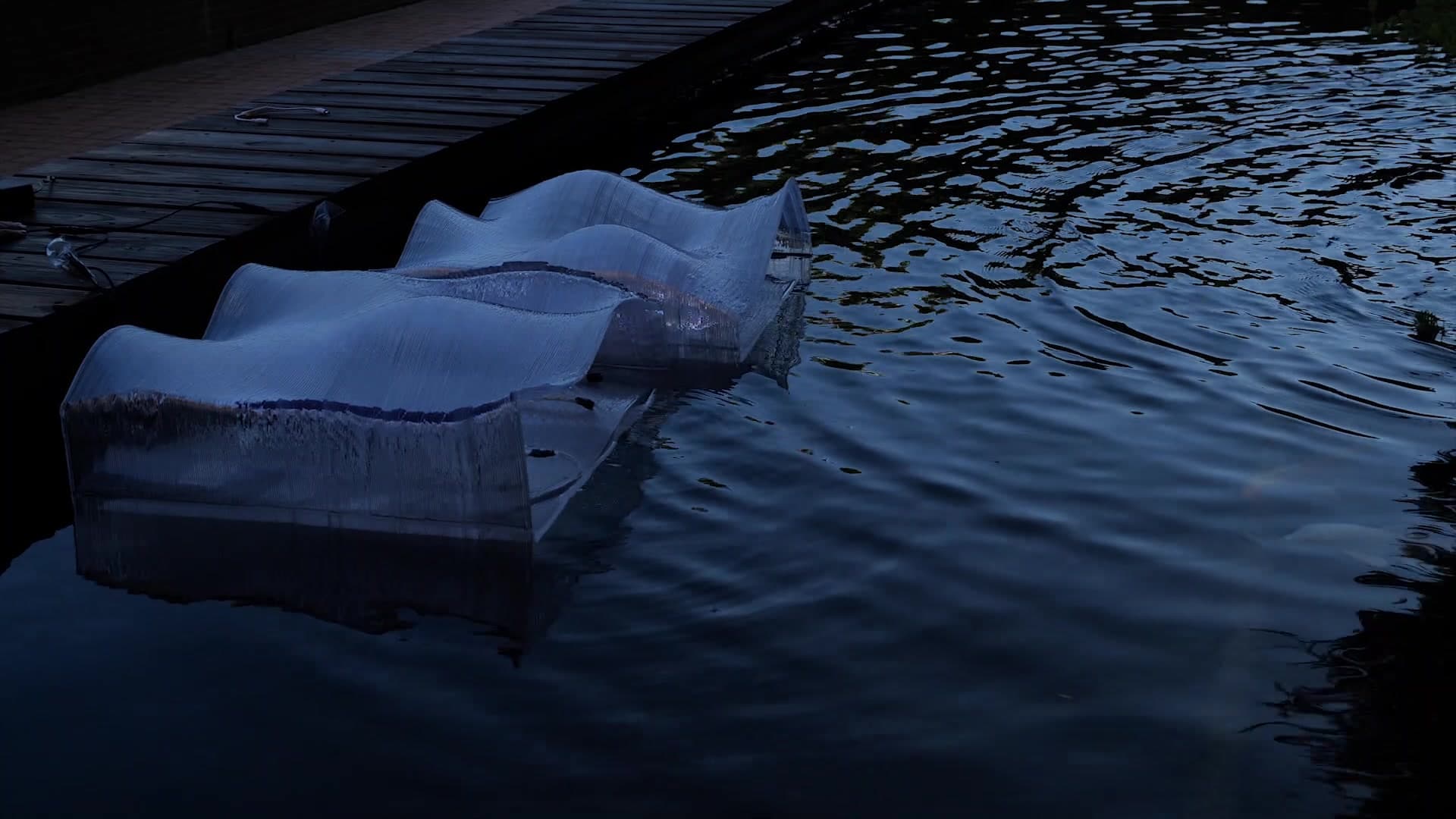 Printed Sparkling modules installed next to rippling water.